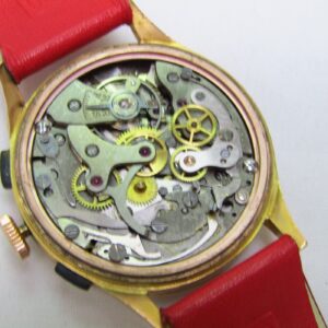 Reloj Cronógrafo de pulsera para caballero. Marca CORANIC. Oro 18k. Suiza, Ca. 1950