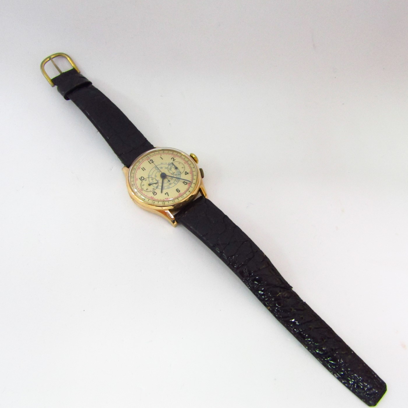 Reloj Cronógrafo de pulsera para caballero. Oro 18k. Suiza, ca. 1950 Reloj Cronógrafo de pulsera para caballero. Oro 18k. Suiza, ca. 1950