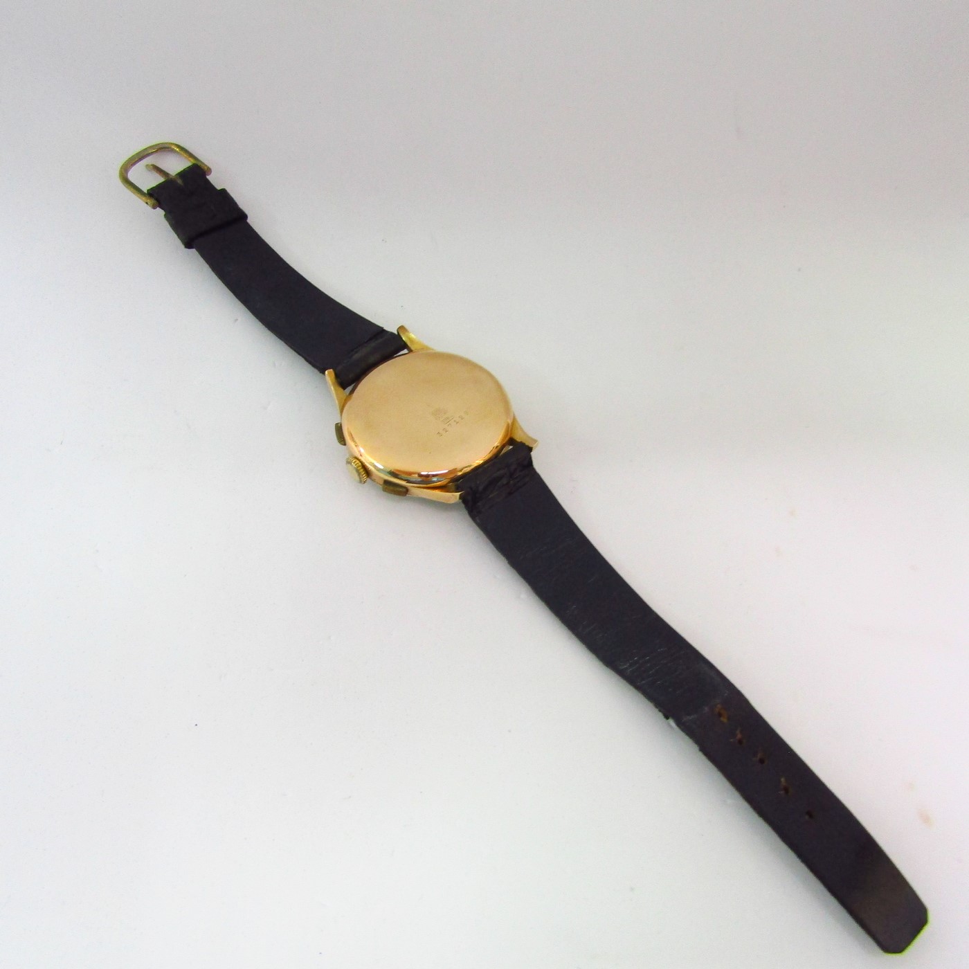 Reloj Cronógrafo de pulsera para caballero. Oro 18k. Suiza, ca. 1950 Reloj Cronógrafo de pulsera para caballero. Oro 18k. Suiza, ca. 1950