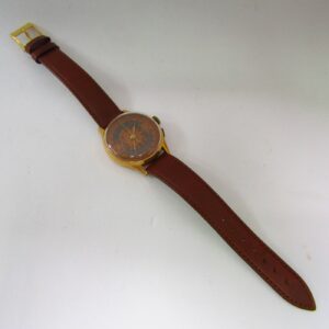 Reloj Cronógrafo de pulsera para caballero. Oro 18k. Suiza, ca. 1955.