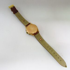 Reloj Cronógrafo de pulsera para caballero. Oro 18k. Suiza, ca. 1955.