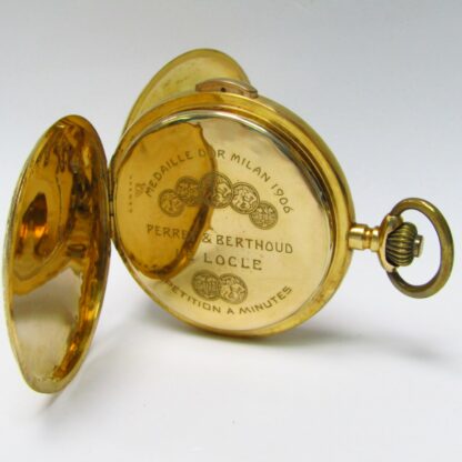 Perret & Berthoud (Le Locle). Repeater clock to minutes, saboneta and remontoir. Circa. 1910. 18k gold.