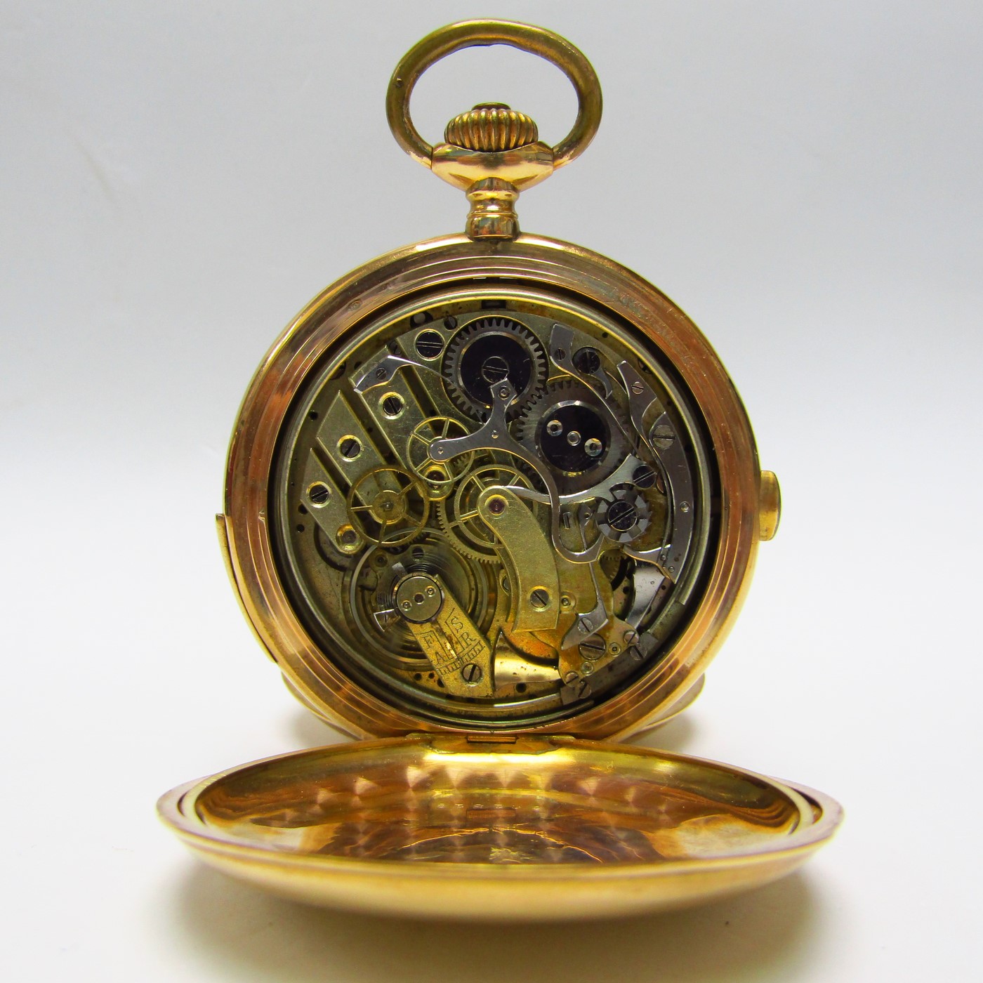 LONGUEVUE. Reloj Cronógrafo de repetición de Horas y Cuartos. Saboneta y remontoir. Oro 18k. Suiza, ca. 1900 LONGUEVUE. Reloj Cronógrafo de repetición de Horas y Cuartos. Saboneta y remontoir. Oro 18k. Suiza, ca. 1900