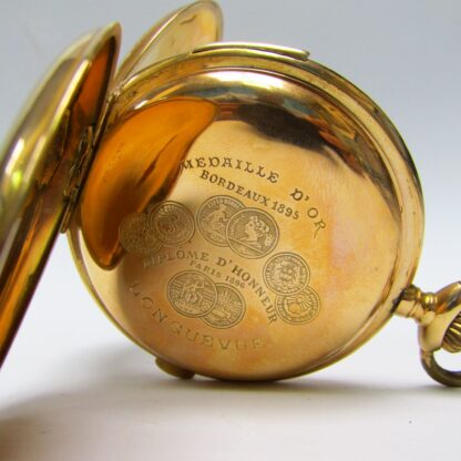 LONGUEVUE. Reloj Cronógrafo de repetición de Horas y Cuartos. Saboneta y remontoir. Oro 18k. Suiza, ca. 1900