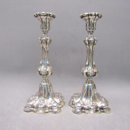 Pair of Louis XV style Candlesticks in Sterling Silver. Spain, 19th century.