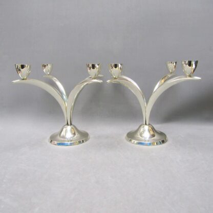 Pair of sterling silver candelabra with four lights. Spain, 20th century.