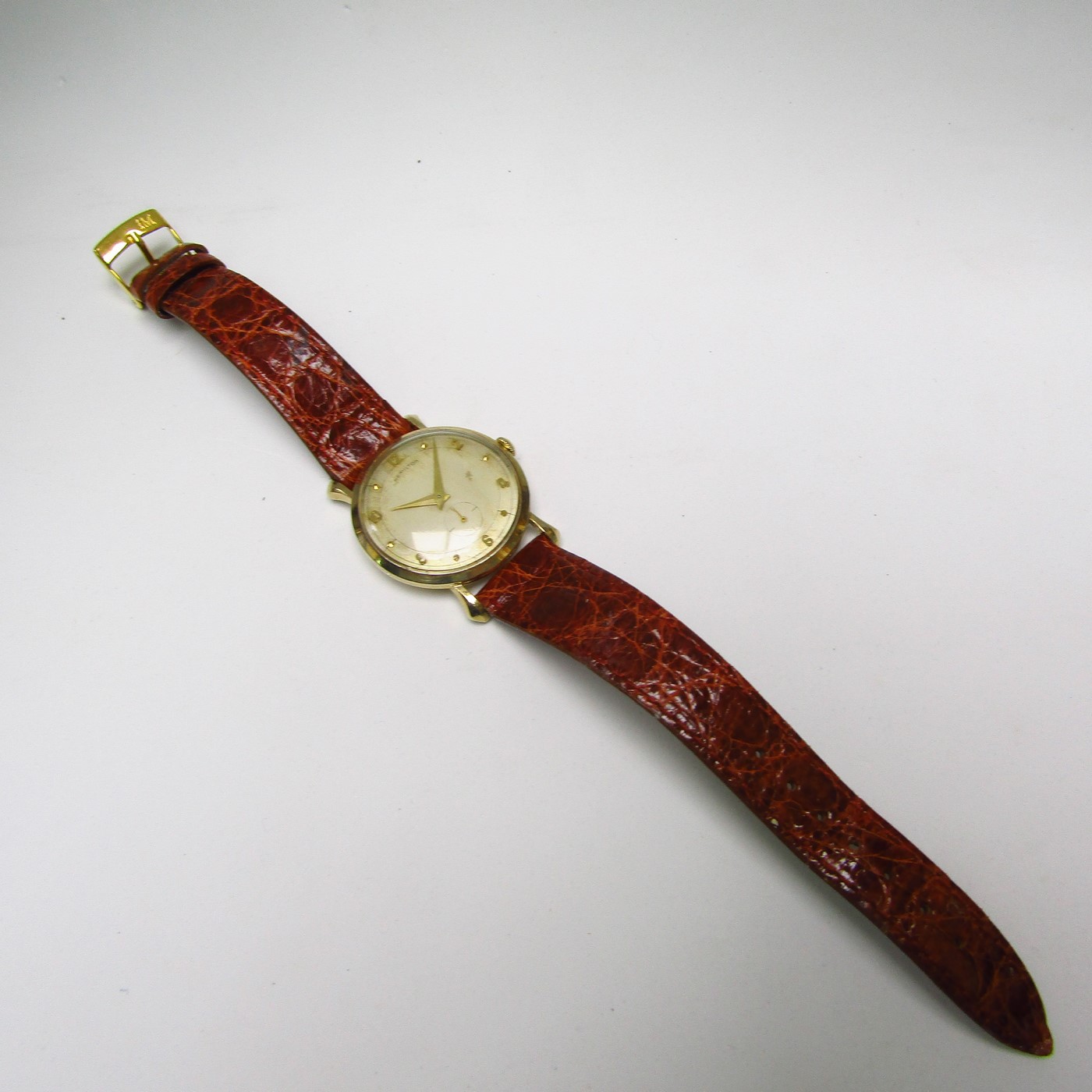 Hamilton. Reloj de pulsera para caballero. Oro 10k. U.S.A., ca. 1950. Hamilton. Reloj de pulsera para caballero. Oro 10k. U.S.A., ca. 1950.