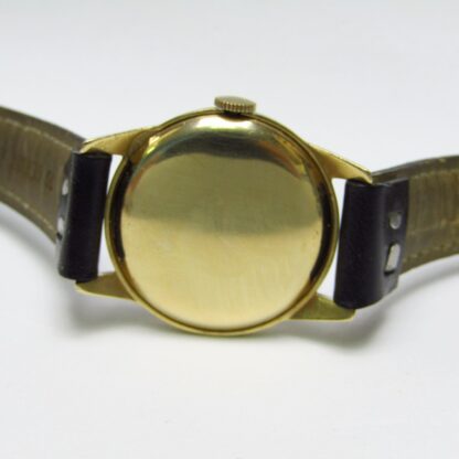 Longines. Montre-bracelet unisexe. or 14 carats. Suisse, 1946.