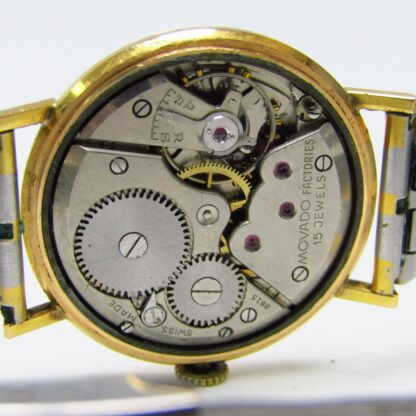 moved. Men's wristwatch. 18k gold. ca. 1960.