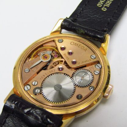 OMEGA. Men's wristwatch. 18k gold. Switzerland, 1952.
