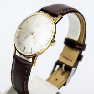 Certina. Reloj de pulsera para caballero. Oro 14k. Suiza, ca. 1960