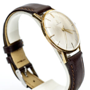 Certina. Reloj de pulsera para caballero. Oro 14k. Suiza, ca. 1960