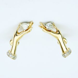 Conjunto de Pulsera, Collar y Pendientes en Oro de 14k, con 4 Diamantes talla Corazón de 0,83 ct. (K-L/SI1-SI2) y 38 diamantes, talla Brillante de 0,57 ct. (H-I/SI). Certificado IGE. 30,49 gr.
