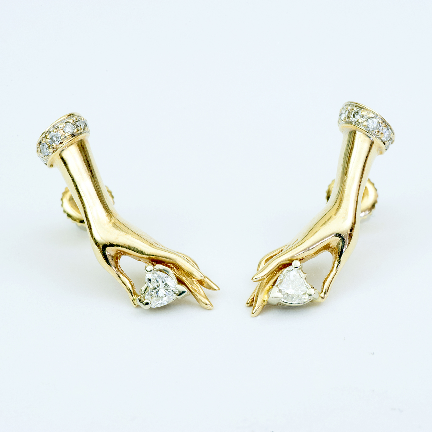 Conjunto de Pulsera, Collar y Pendientes en Oro de 14k, con 4 Diamantes talla Corazón de 0,83 ct. (K-L/SI1-SI2) y 38 diamantes, talla Brillante de 0,57 ct. (H-I/SI). Certificado IGE. 30,49 gr. Conjunto de Pulsera, Collar y Pendientes en Oro de 14k, con 4 Diamantes talla Corazón de 0,83 ct. (K-L/SI1-SI2) y 38 diamantes, talla Brillante de 0,57 ct. (H-I/SI). Certificado IGE. 30,49 gr.