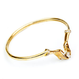 Conjunto de Pulsera, Collar y Pendientes en Oro de 14k, con 4 Diamantes talla Corazón de 0,83 ct. (K-L/SI1-SI2) y 38 diamantes, talla Brillante de 0,57 ct. (H-I/SI). Certificado IGE. 30,49 gr.