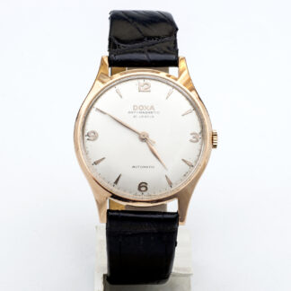 DOXA Automatic. Men's wristwatch. 14k gold. ca. 1970.