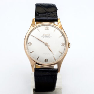 DOXA Automatic. Reloj de pulsera para caballero. Oro 14k. Ca. 1970.