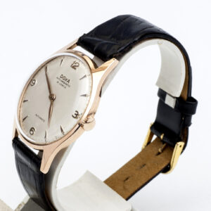DOXA Automatic. Reloj de pulsera para caballero. Oro 14k. Ca. 1970.