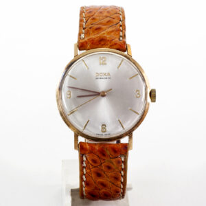 DOXA. Reloj de pulsera para caballero. Oro 14k. Suiza, ca.1950