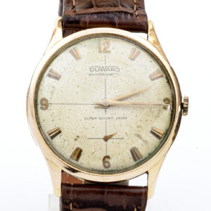 DUWARD Antimagnetic. Reloj de pulsera para caballero. Oro 18k. Acero. Suiza, ca. 1955.