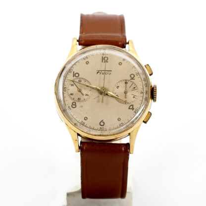 FLUDO. Reloj Cronógrafo de pusera para caballero. Fabricación suiza. Fecha ca. 1950. Oro 18k.