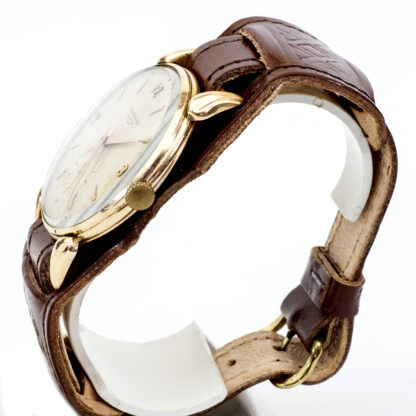 LONGINES. Montre-bracelet pour homme. or 18 carats. Suisse, vers 1945