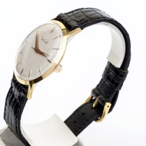 Movado. Reloj de pulsera para caballero. Oro 18k. Ca. 1960.