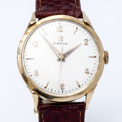 OMEGA. Men's wristwatch. 18k Gold Case. Bracelet in GoldFilled. Switzerland, 1952.
