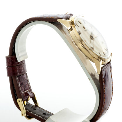 OMÉGA. Montre-bracelet pour homme. Boîtier en or 18 carats. Suisse, 1952.