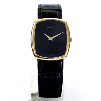 PIAGET. Reloj de Pulsera para caballero.Esfera negra. Oro 18k. Ca. 1957