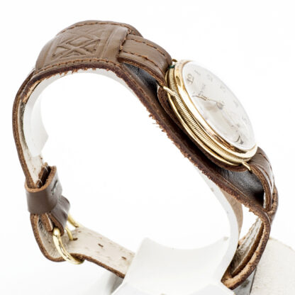 CYMA. Unisex-Armbanduhr. 18 Karat Gold. Schweiz, ca. 1950.