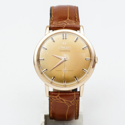 OMÉGA AUTOMATIQUE. Montre-bracelet pour homme. or 18 carats. Suisse, année 1957.