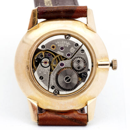 UNIVERSAL GENEVE. Reloj de pulsera unisex. Oro 18k. Suiza, 1964.
