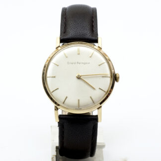 GIRARD PERREGAUX. Guilloché. Reloj de pulsera de caballero. Oro 14k. Suiza, ca. 1960