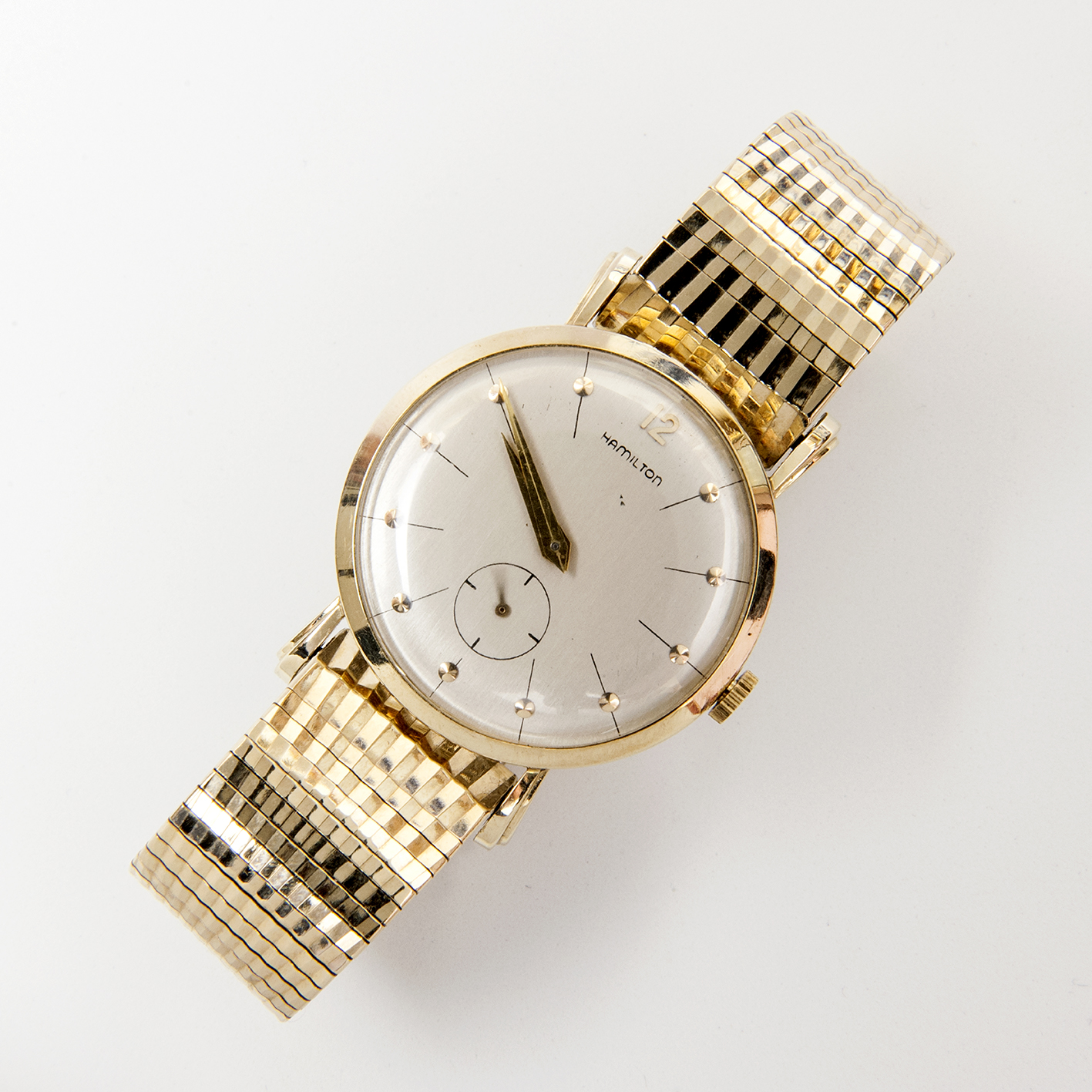 HAMILTON BRADFORD. Reloj de pulsera para caballero. Caja Oro 14k. Pulsera Acero chapado Oro 10k.U.S.A., 1954. HAMILTON BRADFORD. Reloj de pulsera para caballero. Caja Oro 14k. Pulsera Acero chapado Oro 10k.U.S.A., 1954.