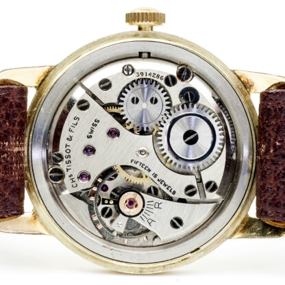 TISSOT. Reloj de pulsera para caballero. Oro 14k. Suiza, Ca. 1950.