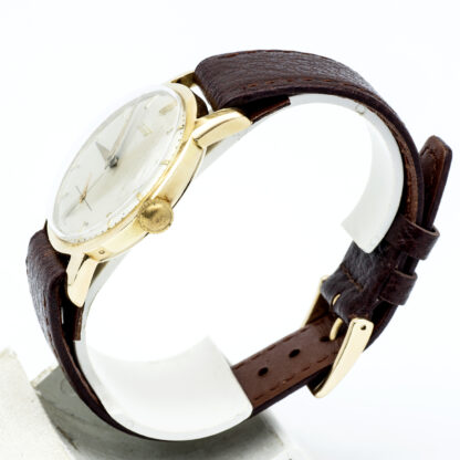 TISSOT. Reloj de pulsera para caballero. Oro 14k. Suiza, Ca. 1950.