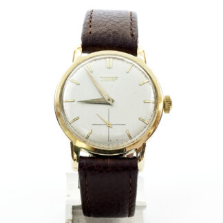 TISSOT. Men's wristwatch. 14k gold. Switzerland, ca. 1950.