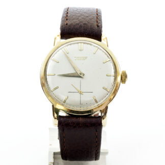 TISSOT. Reloj de pulsera para caballero. Oro 14k. Suiza, Ca. 1950.