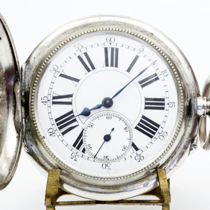 Reloj suizo de bolsillo, saboneta y remontoir. Plata. Suiza, ca. 1880.