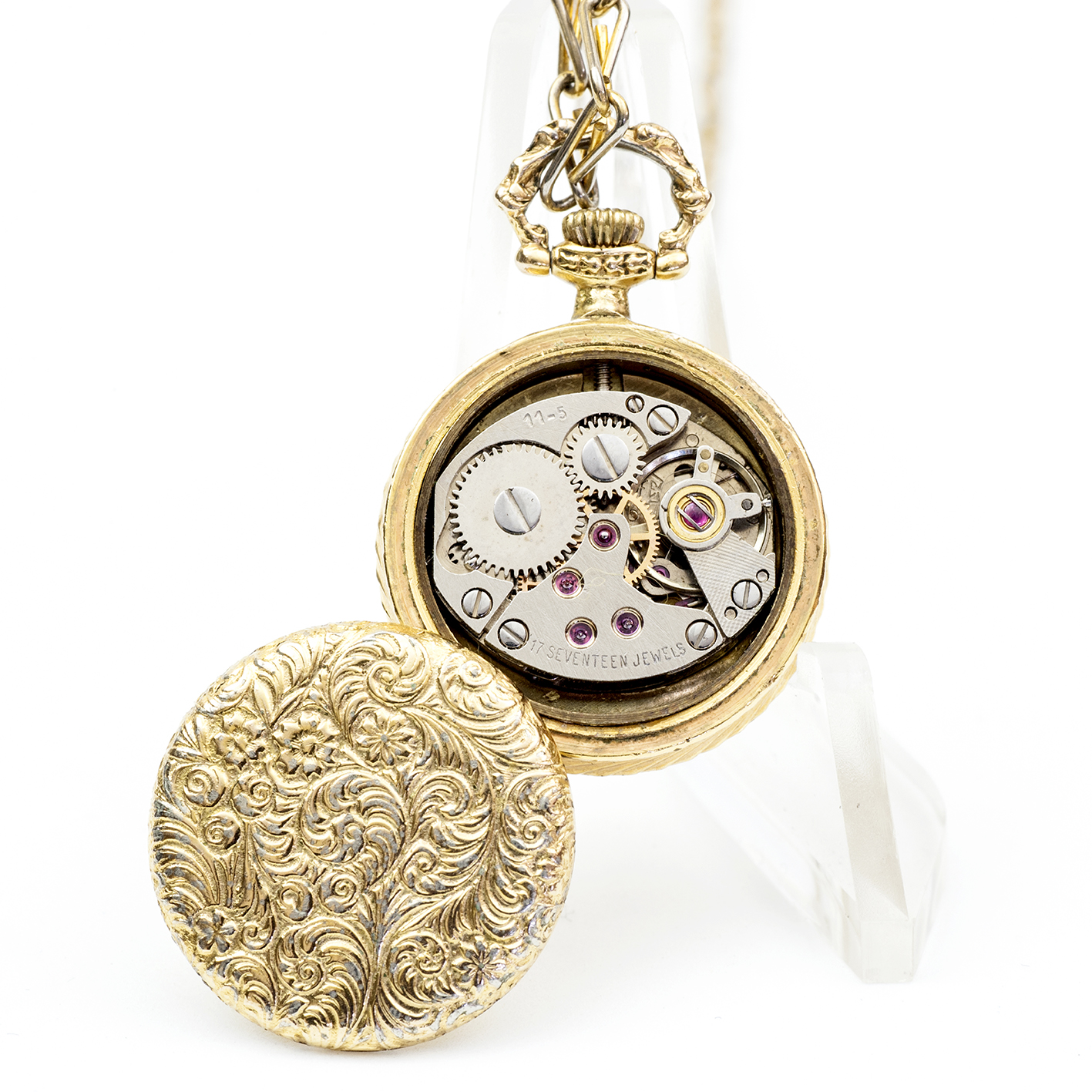 VERNI. France Ebauches, S.A. Reloj de colgar, lepine y remontoir, con cadena. Circa, 1970. VERNI. France Ebauches, S.A. Reloj de colgar, lepine y remontoir, con cadena. Circa, 1970.