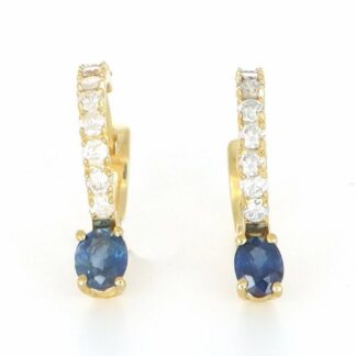 Boucles d'oreilles en or jaune 18 carats. avec 2 Saphirs de 0,50 ct. et 18 diamants taille brillant de 0,54 ct. (F/G-VS/SI). 2,90 gr.
