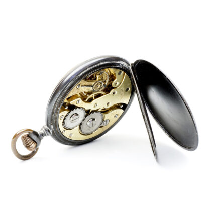 Reloj Erótico de Bolsillo, lepine y remontoir. Automatón. Acero pavonado. Suiza, ca. 1920.