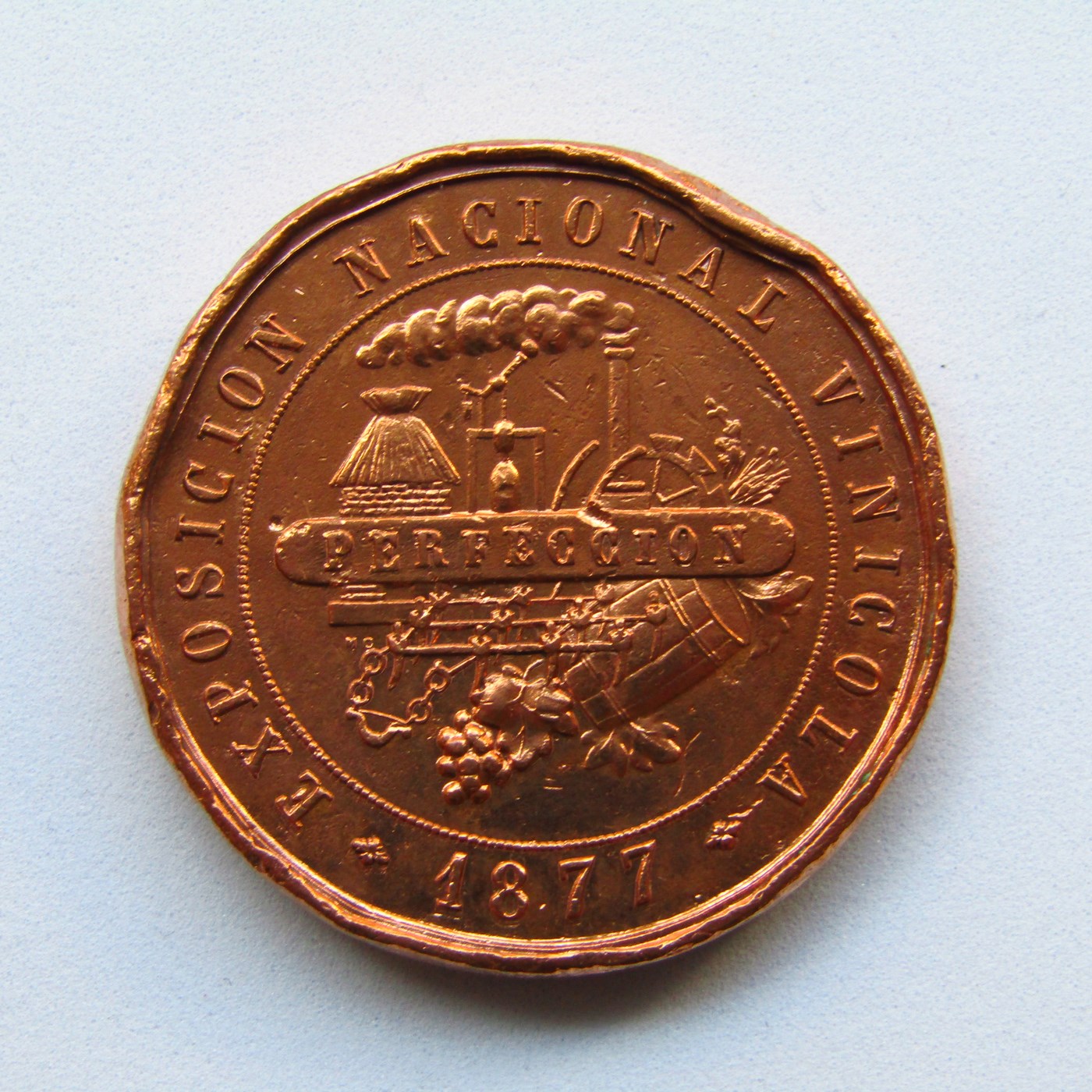 Moneda Conmemorativa de Cobre. Reinado de Alfonso XII. CORTES. Año 1877. Exposición Nacional Vinícola. Perfección. B.C. Moneda Conmemorativa de Cobre. Reinado de Alfonso XII. CORTES. Año 1877. Exposición Nacional Vinícola. Perfección. B.C.