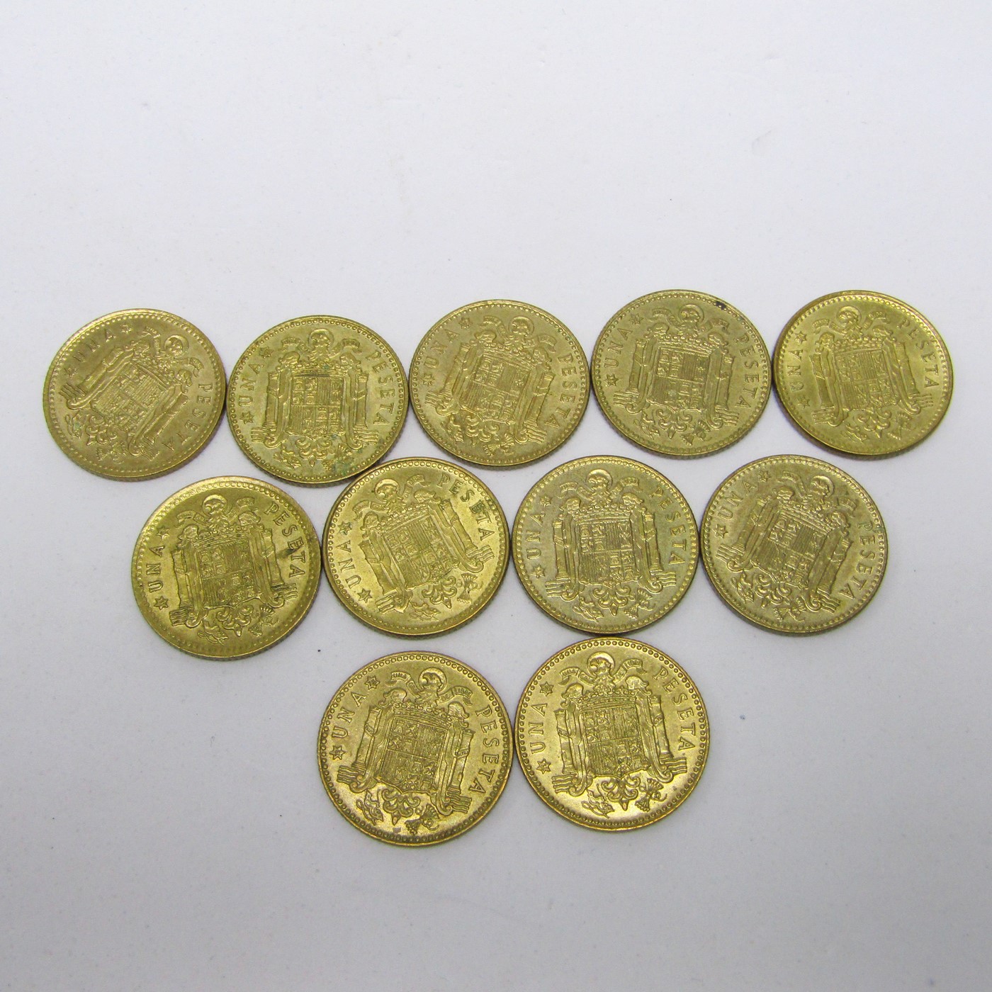 Lote de 11 Monedas de 1 Peseta de Cobre. Año 1975. Juan Carlos I Rey de España. Ceca *19-78*). Algunas variante de tilde Ñ y N de Juan sin punto. MBC Lote de 11 Monedas de 1 Peseta de Cobre. Año 1975. Juan Carlos I Rey de España. Ceca *19-78*). Algunas variante de tilde Ñ y N de Juan sin punto. MBC