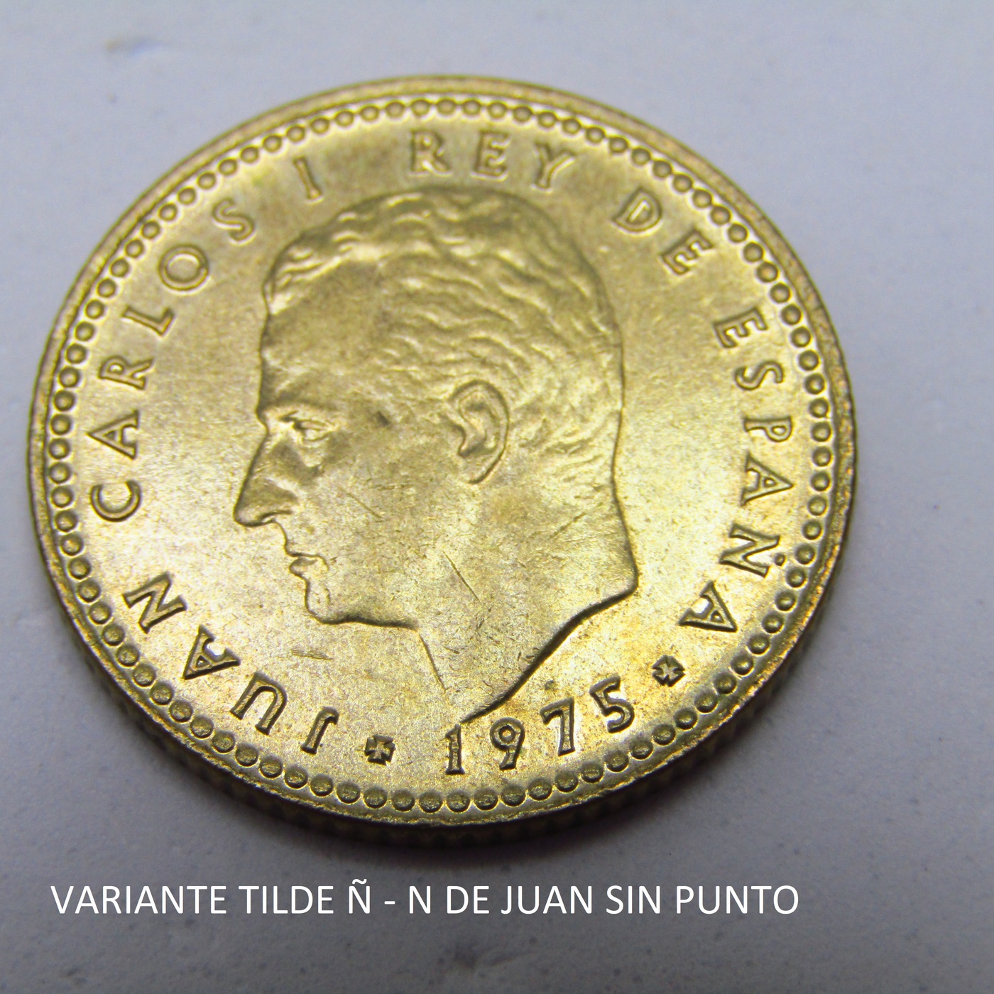 Lote de 11 Monedas de 1 Peseta de Cobre. Año 1975. Juan Carlos I Rey de España. Ceca *19-78*). Algunas variante de tilde Ñ y N de Juan sin punto. MBC Lote de 11 Monedas de 1 Peseta de Cobre. Año 1975. Juan Carlos I Rey de España. Ceca *19-78*). Algunas variante de tilde Ñ y N de Juan sin punto. MBC