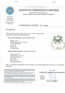 Anillo Certificado de Oro 18k con Diamante Natural Central y Orla de ocho Diamantes, talla Brillante, de 1,02 ct. total (F-G/SI2-SI1-P1). Peso: 5,92 gr.