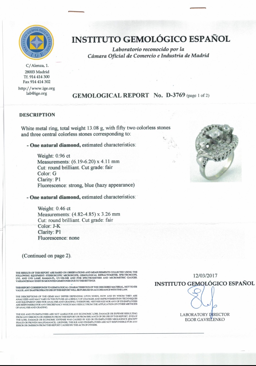 Sortija Certificada en Oro de 18k . 3 Diamantes talla Brillante, de 0,96 ct (G-P1), 0,46 ct. (J-K/P1), 0,40 (J-K/P2) y 52 Diamantes con 1,10 ct. (J-K/SI-P) Sortija Certificada en Oro de 18k . 3 Diamantes talla Brillante, de 0,96 ct (G-P1), 0,46 ct. (J-K/P1), 0,40 (J-K/P2) y 52 Diamantes con 1,10 ct. (J-K/SI-P)