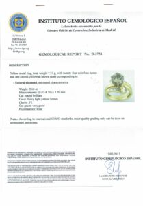 Sortija Certificada en Oro de 18k, con Diamante Central Talla Brillante de 2,62 ct. y 24 Diamantes talla Baguette de 1 ct. aprox.