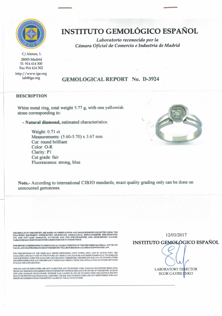 Sortija Certificada en Oro de 18k. Con Diamante Natural talla Brillante, de 0,71 ct. (O-R/P1), 17 mm. Sortija Certificada en Oro de 18k. Con Diamante Natural talla Brillante, de 0,71 ct. (O-R/P1), 17 mm.